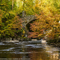 Buy canvas prints of Stone bridge over River Braan in autumn by Angus McComiskey