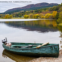 Buy canvas prints of Beached boat on Lake of Menteith by Angus McComiskey