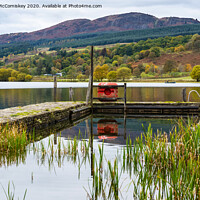 Buy canvas prints of Landing stage on Lake of Menteith by Angus McComiskey
