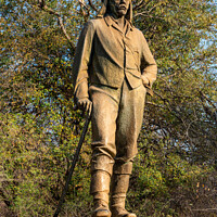 Buy canvas prints of Statue of David Livingstone at Victoria Falls by Angus McComiskey