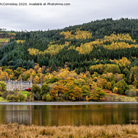 Buy canvas prints of Autumn view across Loch Achray by Angus McComiskey
