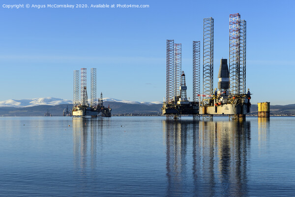 Decommissioned oil rigs in Cromarty Firth Picture Board by Angus McComiskey