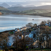 Buy canvas prints of Carbost village and Loch Harport, Isle of Skye by Angus McComiskey