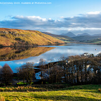 Buy canvas prints of Loch Harport reflections, Isle of Skye by Angus McComiskey