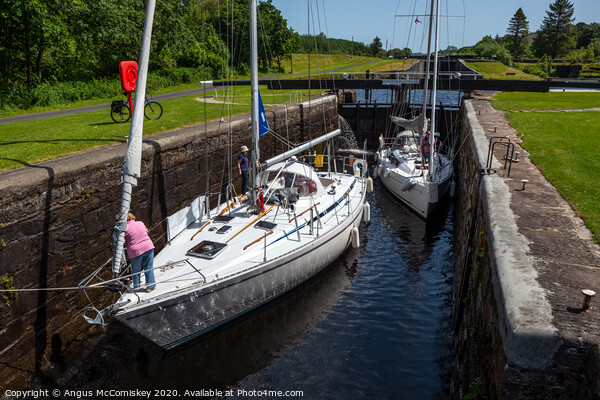 Yachts between locks at Dunardry on Crinan Canal Picture Board by Angus McComiskey