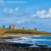 Buy canvas prints of Dunstanburgh Castle Northumberland by Angus McComiskey