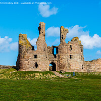 Buy canvas prints of Main entrance Dunstanburgh Castle Northumberland by Angus McComiskey