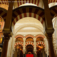 Buy canvas prints of Pillars and arches in Cordoba Cathedral by Angus McComiskey