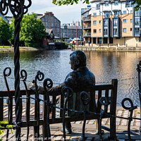 Buy canvas prints of Bronze sculpture overlooking the Water of Leith by Angus McComiskey