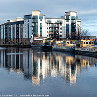 Buy canvas prints of Moored barges on The Shore in Leith, Edinburgh by Angus McComiskey