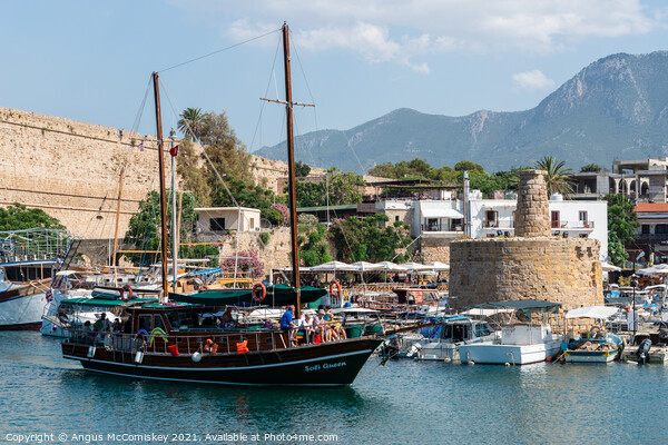 Gullet arriving at Kyrenia harbour Northern Cyprus Picture Board by Angus McComiskey