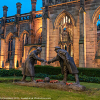 Buy canvas prints of Christmas truce football statue Liverpool by night by Angus McComiskey