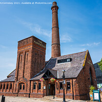 Buy canvas prints of Victorian Pumphouse, Royal Albert Dock, Liverpool by Angus McComiskey
