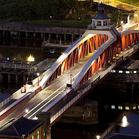 Buy canvas prints of Swing Bridge at night, Newcastle upon Tyne by Alan Crawford