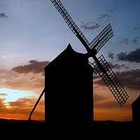 Buy canvas prints of Sunset Windmills by Alan Crawford