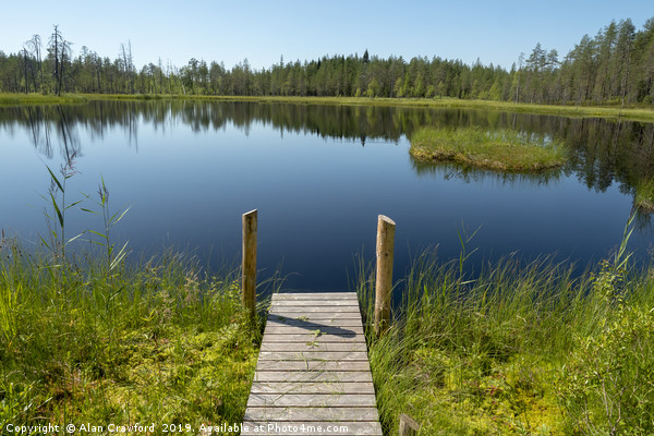 Jetty by a lake in Finland Picture Board by Alan Crawford