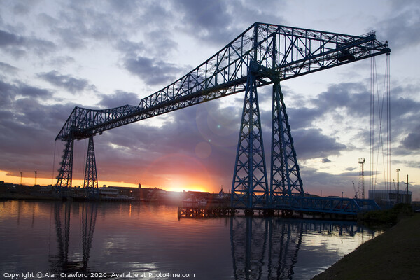 The Tees Transporter Bridge at sunset Picture Board by Alan Crawford
