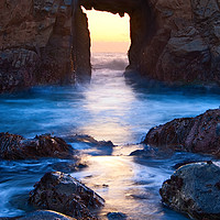 Buy canvas prints of Sunset on Arch Rock in Pfeiffer Beach, Big Sur. by Jamie Pham