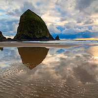 Buy canvas prints of Cannon Beach with storm clouds in Oregon by Jamie Pham