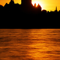 Buy canvas prints of The Chateau Frontenac silhouetted against the sunset by Colin Woods