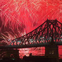 Buy canvas prints of Fireworks and the Jacques Cartier Bridge, Montreal by Colin Woods
