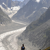 Buy canvas prints of A lone person admiring the Mer de Glace, Chamonix by Colin Woods