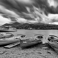 Buy canvas prints of Boats on the Shore of Derwentwater in the Lake Dis by Colin Woods