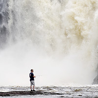 Buy canvas prints of River fishing by a big waterfall in Quebec by Colin Woods