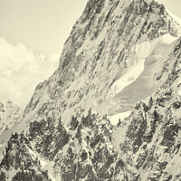 Buy canvas prints of The tiny figure of a climber in front  of the Grandes Jorasses by Colin Woods