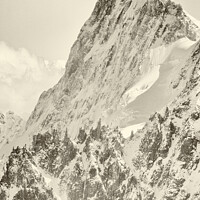 Buy canvas prints of The tiny figure of a climber in front  of the Grandes Jorasses by Colin Woods