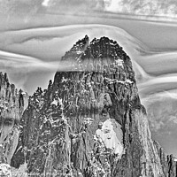 Buy canvas prints of Clouds forming around the Aiguille de Dru in the French Alps by Colin Woods