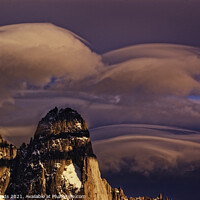 Buy canvas prints of Clouds forming around the Aiguille de Dru in the French Alps by Colin Woods