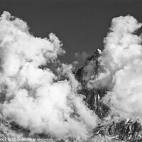 Buy canvas prints of Clouds and peaks in the French Alps by Colin Woods