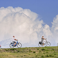 Buy canvas prints of Cyclists and Thunderstorm by Arterra 