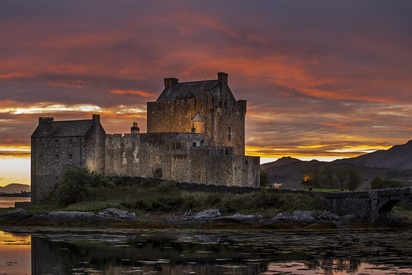 Eilean Donan Castle at sunset in Loch Duich Picture Board by Arterra 