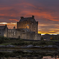 Buy canvas prints of Eilean Donan Castle at sunset in Loch Duich by Arterra 