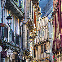 Buy canvas prints of Old Timber Framed Houses in Vannes, Brittany by Arterra 