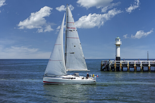 Sailing Boat Leaving the Nieuport Harbour Picture Board by Arterra 