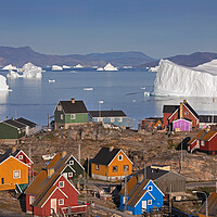 Buy canvas prints of Uummannaq Village and Giant Iceberg, Greenland by Arterra 