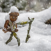 Buy canvas prints of Little Acorn Man Hiking in the Snow by Arterra 
