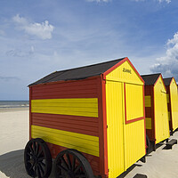 Buy canvas prints of Yellow and Red Beach Huts on Wheels by Arterra 
