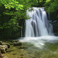 Buy canvas prints of The Mesmerizing Beauty of Janets Foss Waterfall by Jim Round