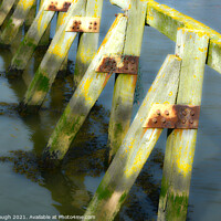 Buy canvas prints of Wooden Harbour Barriers by Philip Gough