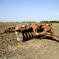 Buy canvas prints of FIELD PLOUGHING MACHINE by Philip Gough