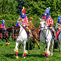 Buy canvas prints of CLOWN RIDERS by Philip Gough