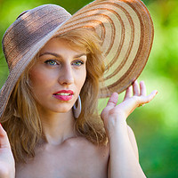 Buy canvas prints of Beautiful blonde with hat outdoors by Ragnar Lothbrok