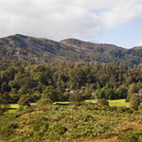 Buy canvas prints of Elterwater village and Langdale in the Lake Distri by Joseph Clemson
