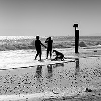 Buy canvas prints of Family playing in the sea by George Cairns
