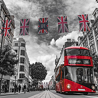 Buy canvas prints of British bus and flags in Oxford Street, London by George Cairns