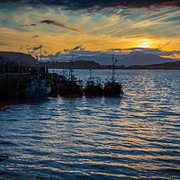 Buy canvas prints of The sun sets on Oban harbour and fishing boats by George Cairns
